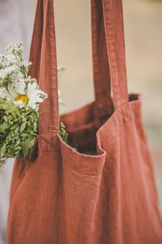 "Natural linen tote bag perfect for everyday use. Beautifully made of high-quality linen that feels lovely to the touch. Linen is environmentally friendly, durable, and looks better and better with age. Which is your favorite color? Terracotta / Olive / Ocean Standard bag size: (as in the photos) 40x42x10 cm / 16x17x4\" Handles size: (strap drop length) 34 cm / 13\" Larger bag size: 50x44x10 cm / 20x17x4\" Handles size: (strap drop length) 40 cm / 16\" *Custom size available. Please feel free to Tod Bag, Terracotta Linen, Linen Tote Bag, Handmade Tote Bag, Casual Tote Bag, Linen Summer, Farmers Market Bag, Eco Tote Bag, Summer Bag