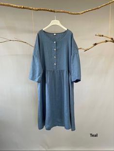 Linen Solid Color Daywear Dresses, Solid Color Linen Day Dresses, Solid Color Relaxed Fit Midi Dress, Cotton Midi Dress With Buttons, Relaxed Fit Solid Color Midi Dress, Spring Midi Dress With Buttons And Relaxed Fit, Casual Linen Midi Dress In Solid Color, Short Sleeve Linen Midi Dress For Fall, Fall Linen Midi Dress