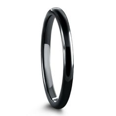 a black wedding ring on a white background