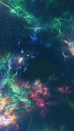 an image of the inside of a space filled with stars and colorful dust, as seen from above