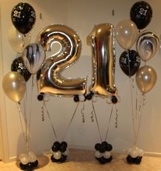 the number twenty two is surrounded by balloons