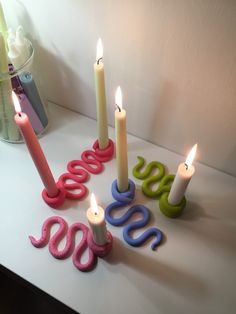 candles are arranged in the shape of letters and numbers