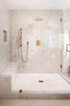 A shower is tiled in a creamy white zellige, with a tiled bench and brass hardware. Bathroom Redesign, Master Bath Remodel, Casa Container, Bathroom Remodel Designs, Bathroom Remodel Shower, Bathroom Inspiration Decor, Upstairs Bathrooms