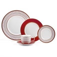 red and white dinnerware set with saucer, coffee cup and saucer on the side