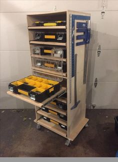 a tool cabinet with drawers and tools in it