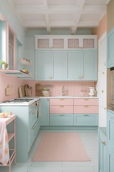 a kitchen with pastel blue cabinets and pink flooring is seen in this image