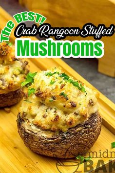 crab rangoon stuffed mushrooms on a cutting board with text overlay that reads crab rangoon stuffed mushrooms