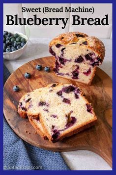 two slices of blueberry bread on a cutting board