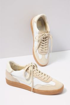 Elevate your look with the Notice Sneaker by Dolce Vita, featuring a low-top silhouette, metallic leather detailing, and a snake-embossed heel tab. Show them off with a midi dress or your favorite ankle jeans. | DOLCE VITA Women's Notice Sneakers, Size 9.5, White Ugg Style, Fashion 101, Shoe Size Conversion, Sock Shop, Fashion Lookbook, Ankle Jeans, Metallic Leather, Work Fashion, Elevate Your Look