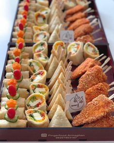 an assortment of appetizers are displayed on a tray