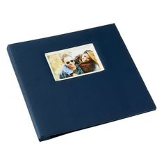 a blue album with an image of two people on the front and one in the back