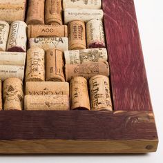 a wooden box filled with lots of wine corks