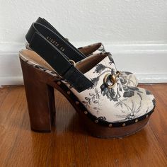 Rare Authentic Gorgeous Gucci Floral Clogs In Womens Size 38. Us 7.5 Only Worn Once And Retail Over $1300 Purchase At Saks Fifth Avenue Luxury Clogs With Wooden Open Heel, Gucci High Heel Mules With Branded Heel Counter, Gucci Platform Heels With Round Toe, Gucci Designer High Heel Mules, Gucci Elegant High Heel Mules, Elegant Gucci High Heel Mules, Luxury High Heel Clogs With Leather Sole, Luxury Mules With Stacked Heel And Round Toe, Gucci Black Mules With Round Toe