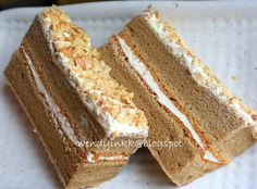 two slices of cake sitting on top of a white plate