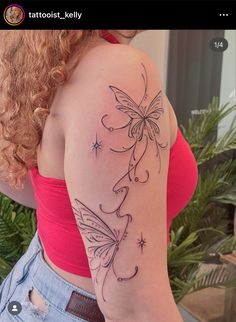 a woman with a butterfly tattoo on her left arm and shoulder is looking at the camera