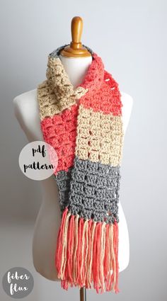 a crocheted scarf on a mannequin with the words free pattern below it