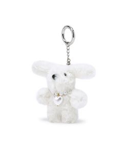 a white stuffed animal keychain with a heart on it's chest and eyes