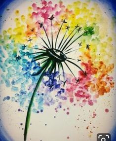 a dandelion painted with watercolors in the shape of a rainbow flower