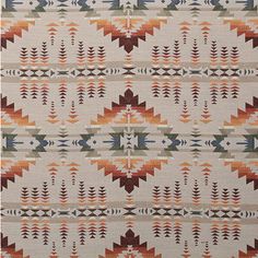 an orange, brown and white rug with geometric designs on it's sides in various colors