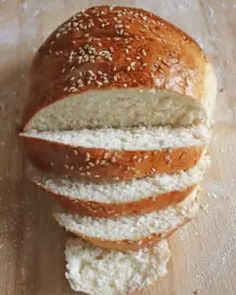 a loaf of bread with sesame seeds on top