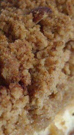 a close up view of some food with crumbs on the top and bottom