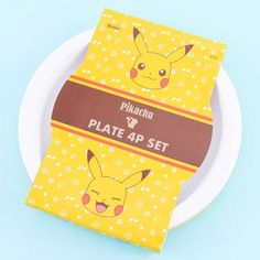 a plate topped with two pieces of pokemon pikachu paper