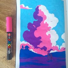 a pink and blue painting next to a marker on a piece of paper with clouds in the sky