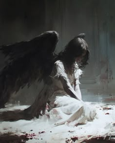 a painting of an angel sitting on the ground