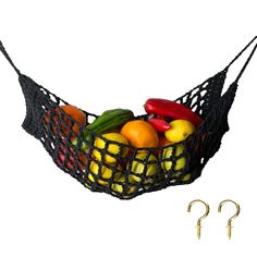 PRICES MAY VARY. Cotton Save space. Are you tired of cluttered table tops, let us use this product hammock to hang fruits and vegetables under cabinet and free up your counters . This under cabinet fruit hammock is especially important for RVers or campers where space is at a premium. Tested by a dozen veteran craftsmen for weaving and storage, our black macrame fruit hammock has smaller woven hole spacing and more storage space, which keeps more small fruits from falling out and stores more fru Macrame Fruit Hammock, How To Store Bananas, Basket Macrame, Hammock Photos, Fruit Hammock, Banana Hammock, Crochet Hammock, Hanging Fruit Basket, Toy Hammock