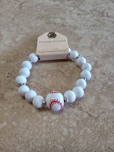 Beaded Baseball Bracelets Casual Adjustable Bracelets For Team Events, Personalized White Bracelets For Football Season, Adjustable White Tennis Bracelet As Gift, Adjustable White Wristband For Sports, White Team Spirit Wristbands For Team Events, White Team Spirit Wristband For Team Events, Personalized White Beaded Bracelets For Football Season, Personalized Adjustable Stretch Bracelet For Game Day, Sporty Adjustable Beaded Bracelets For Game Day