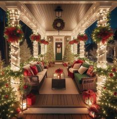 a porch covered in christmas lights and decorated for the holiday season with red and green decorations