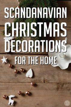 the cover of scandinavian christmas decorations for the home, featuring white flowers and gold bells