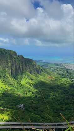 a green mountain range in oahu, hawaii Hawaii Mountains Aesthetic, Hiking Aesthetic Hawaii, Hawaii Culture Aesthetic, Hawaii Living Aesthetic, Uh Manoa Aesthetic, Hawaii Aesthetic Vintage, University Of Hawaii At Manoa Aesthetic, University Of Hawaii Aesthetic, College In Hawaii