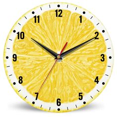 a clock made to look like a lemon slice with numbers on the face and hands