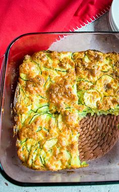 a casserole dish with zucchini and cheese