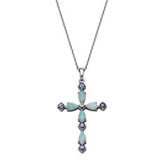 10K White Gold Multigemstone Cross Pendant with Chain  Adorn your neckline with a luminating symbol of your Christian faith. This beautiful white gold cross pendant is comprised of shimmering created opals and beautiful blue tanzanite with a created white sapphire accent at center.        Pendant approx. 1-3/8"L x 13/16"W     Chain approx. 16"L with 2" extender     Stamped 10K white gold; rhodium plating     Cable chain necklace; lobster claw clasp   Stone Information       All sizes and weights White Gold Cross Pendant, Cable Chain Necklace, Gold Cross Pendant, Blue Tanzanite, Color Bands, Pendant With Chain, Gold Cross, White Sapphire, Christian Faith