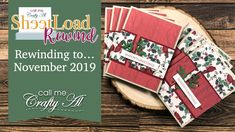 some red and green christmas cards on top of a wooden table with the words, rewinding to november 2019