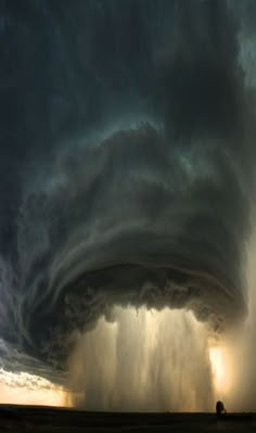 a large storm cloud is seen in the distance