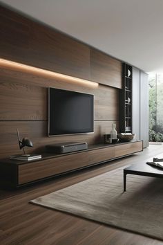 a modern living room with wood paneling and large television on the entertainment center wall