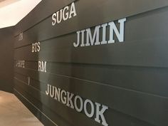 there are many names on the wall in this building that says suga, jumin, and sunggkok