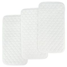 three white placemats on a white background