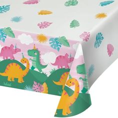 a table cloth with dinosaurs on it