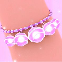 a pink necklace with flowers on it