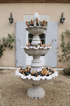 a fountain filled with lots of wine bottles