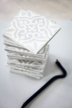 a stack of white paper sitting on top of a table