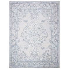 a white rug with blue accents