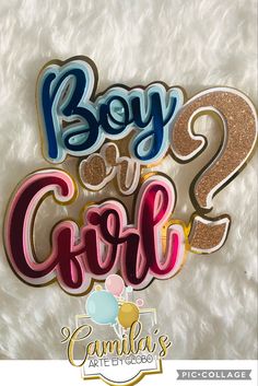 two birthday cake toppers with the words boy and girl 2 on them in gold, blue, pink, and purple