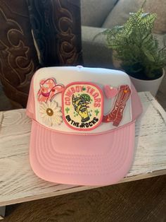 Cute Trucker Hat! Perfect for gift, Rodeo , or a day at the Lake! :) Details:  *Pink/ White *Polyester with Iron-on patches *One Size Hat with adjustable snap back; adjustable 20 inches to 23.5 inches Cheap Logo Patch Trucker Hat, Adjustable Pink Trucker Hat With Patches, Pink Cap With Patches, Cute Flat Brim Hat One Size, Retro Pink Summer Hat, Vintage Pink Snapback Trucker Hat, Pink Vintage Snapback Trucker Hat, Fun Adjustable Hats With Patches, Fun Adjustable Hat With Patches