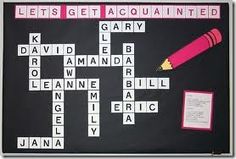 a blackboard with pink and white scrabbles on it that says let's get acquainted