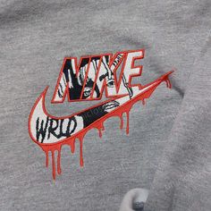 The Juice Wrld Nike Embroidered Sweatshirt is a must-have for any fan of the late rapper. Made with premium materials, this sweatshirt features an embroidered Juice Wrld graphic on the front, showcasing his iconic style. With a comfortable fit and a classic Nike design, it offers both style and comfort. Embrace your love for Juice Wrld and stay cozy in this unique sweatshirt. The Nike Logo Embroidered Hoodie is a timeless piece that combines style and quality. Made with soft and durable fabric, Nike Ideas, Nike Embroidered Sweatshirt, Celebrity Shirts, Sweatshirt Nike, Nike Design, Unique Sweatshirt, Embroidery Hoodie, Nike Sweatshirt, Logo Shirt